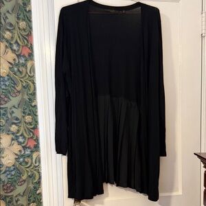 Cyrus Black Women's long Cardigan with pleated back.